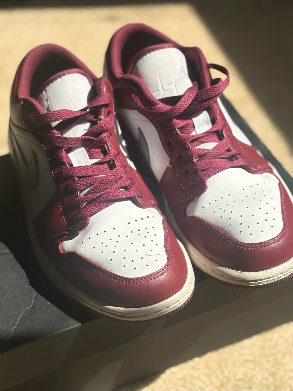 Jordan Air Jordan 1 Low in Cherrywood Red and Cement Grey